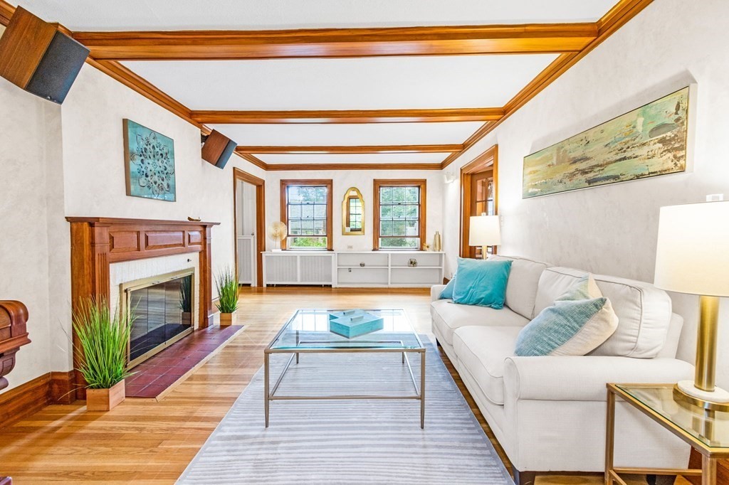 27 Whitney Road Newton, MA 02460 - Photo 6 of 32 a living room with furniture and a fireplace
