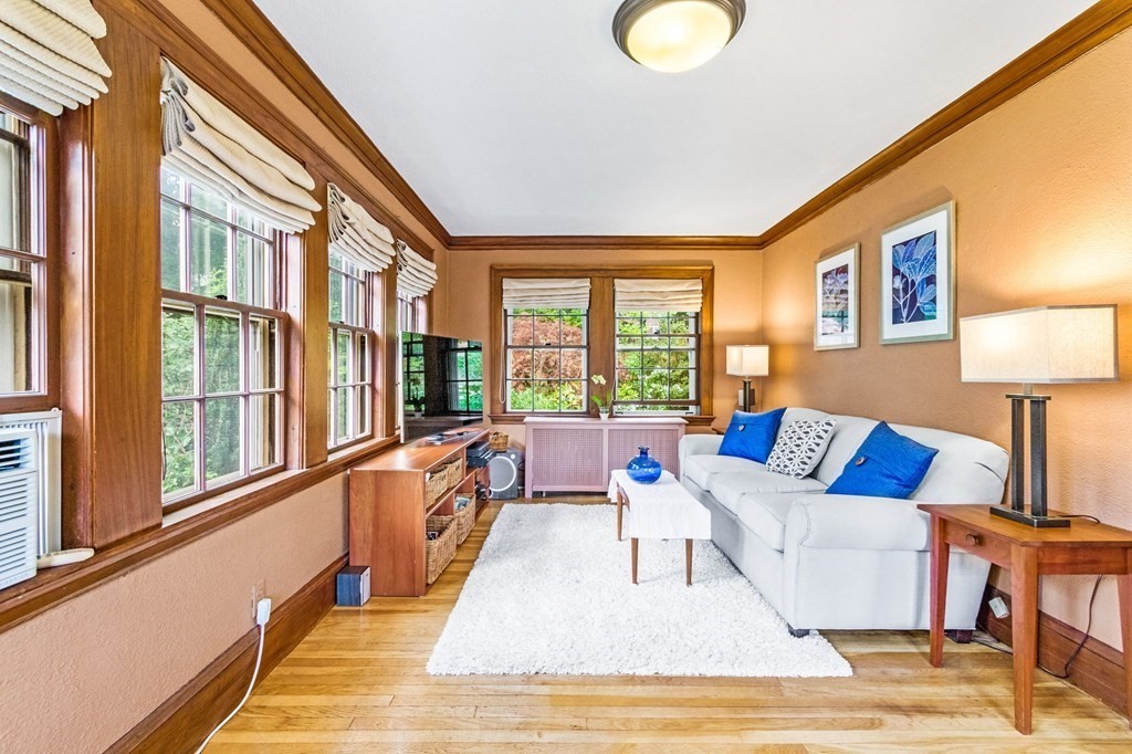 27 Whitney Road Newton, MA 02460 - Photo 7 of 32 a living room with furniture and a large window