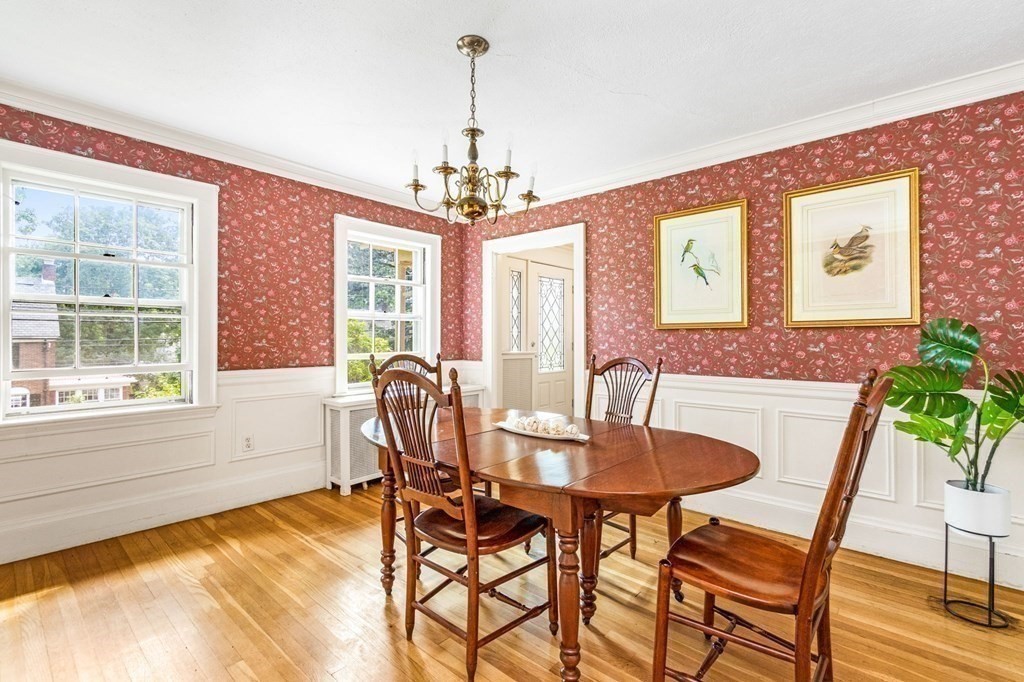 27 Whitney Road Newton, MA 02460 - Photo 9 of 32 a view of a dining room with furniture window and wooden floor