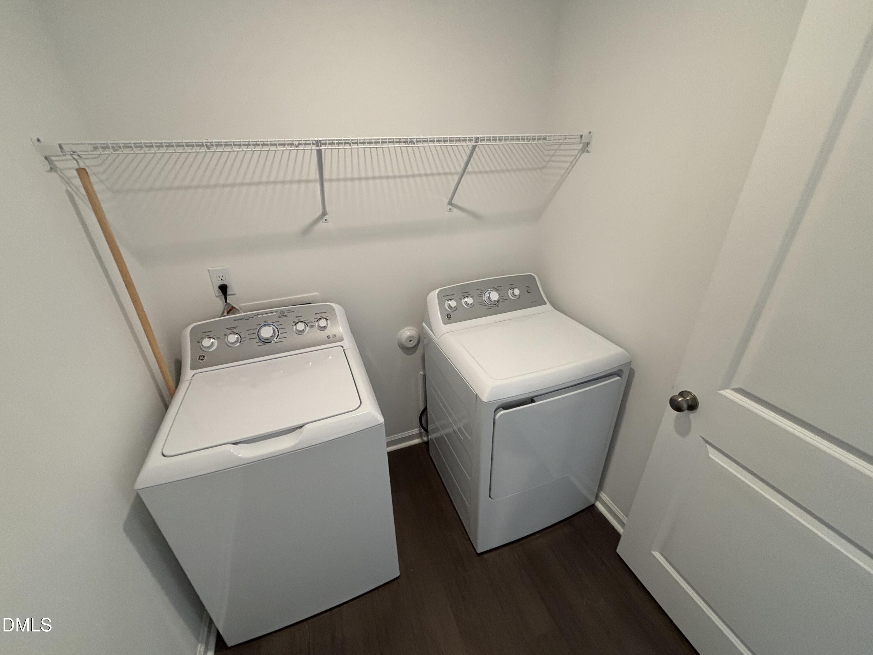 162 Blossom Fld Way Angier, NC 27501 - Photo 16 of 45 a utility room with dryer and washer