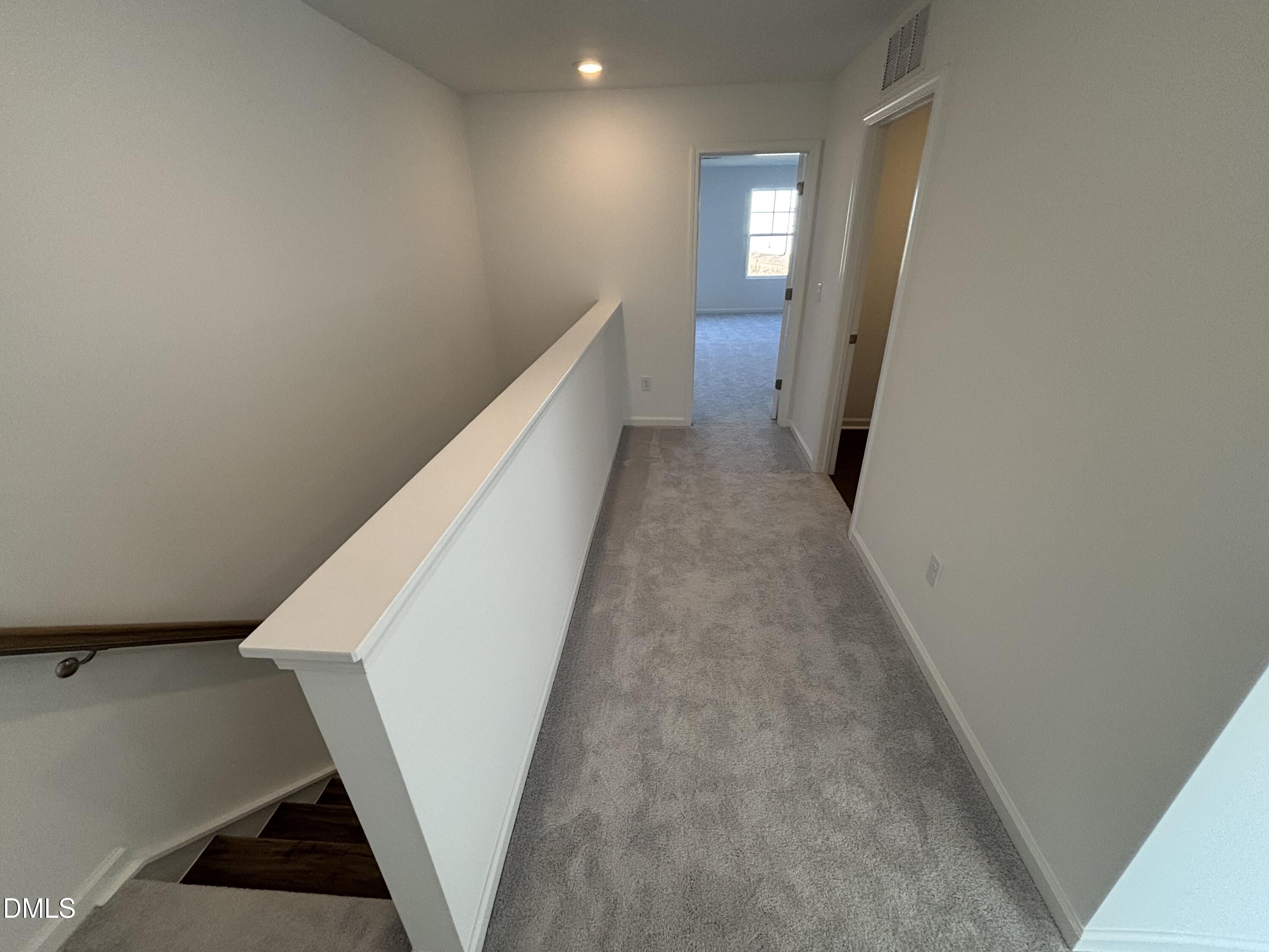 162 Blossom Fld Way Angier, NC 27501 - Photo 17 of 45 a view of hallway with stairs