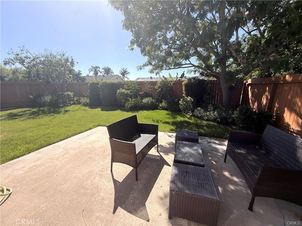 14901 Waverly Lane Irvine, CA 92604 - Photo 13 of 13 a view of backyard with outdoor seating and green space