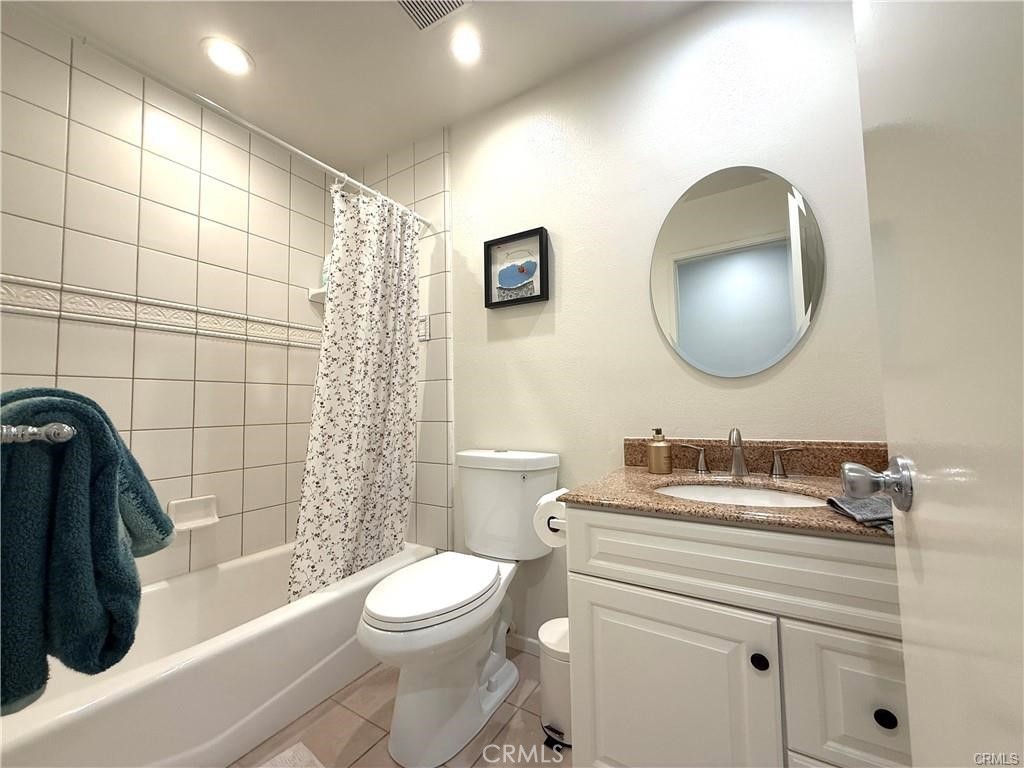 14901 Waverly Lane Irvine, CA 92604 - Photo 8 of 13 a bathroom with a sink a toilet and shower