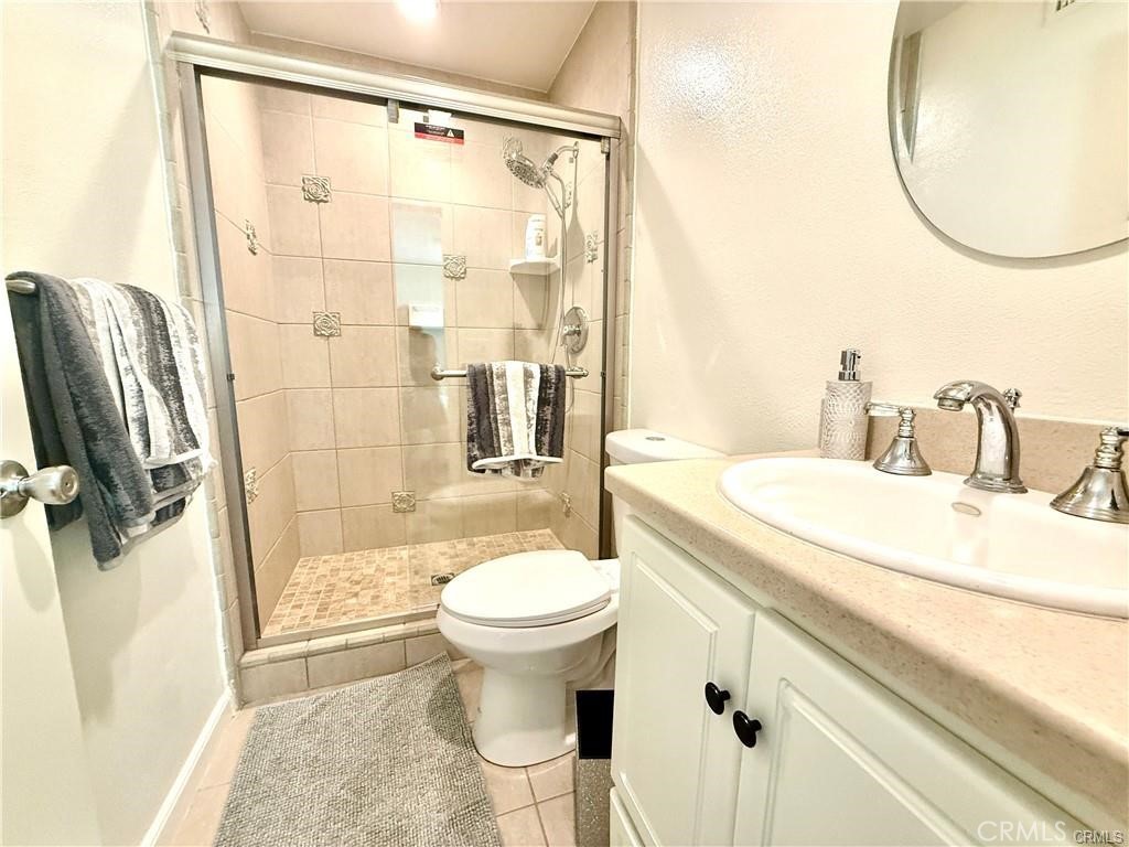 14901 Waverly Lane Irvine, CA 92604 - Photo 9 of 13 a bathroom with a sink toilet and shower