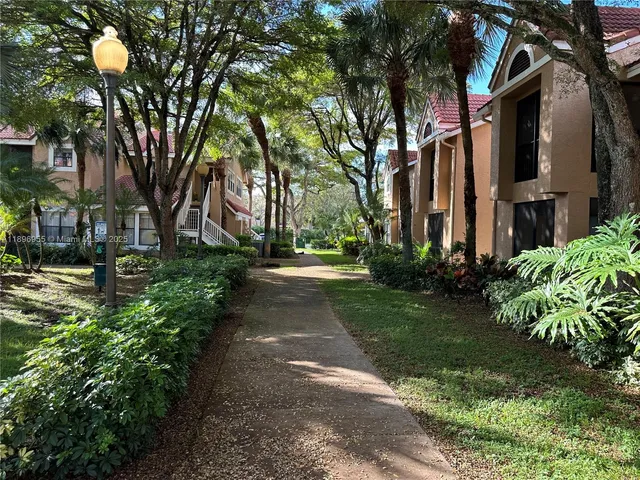 a view of road with trees