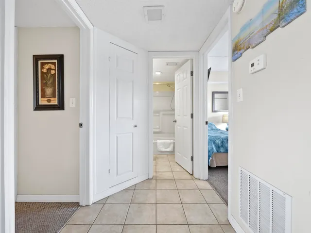 a bathroom with a shower and a sink