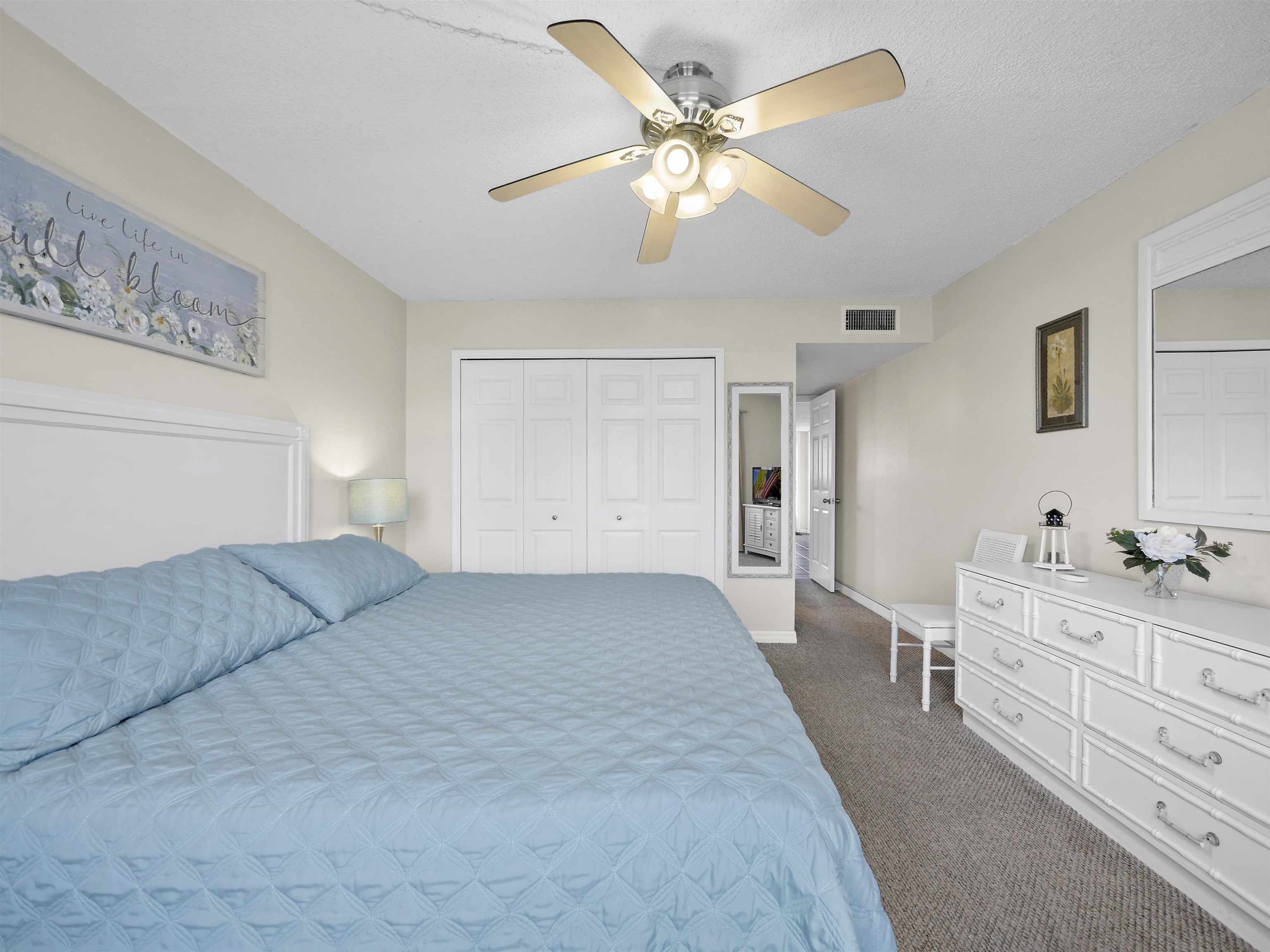 7175 A1A South St. Augustine, FL 32080 - Photo 18 of 35 a living room with furniture and a chandelier