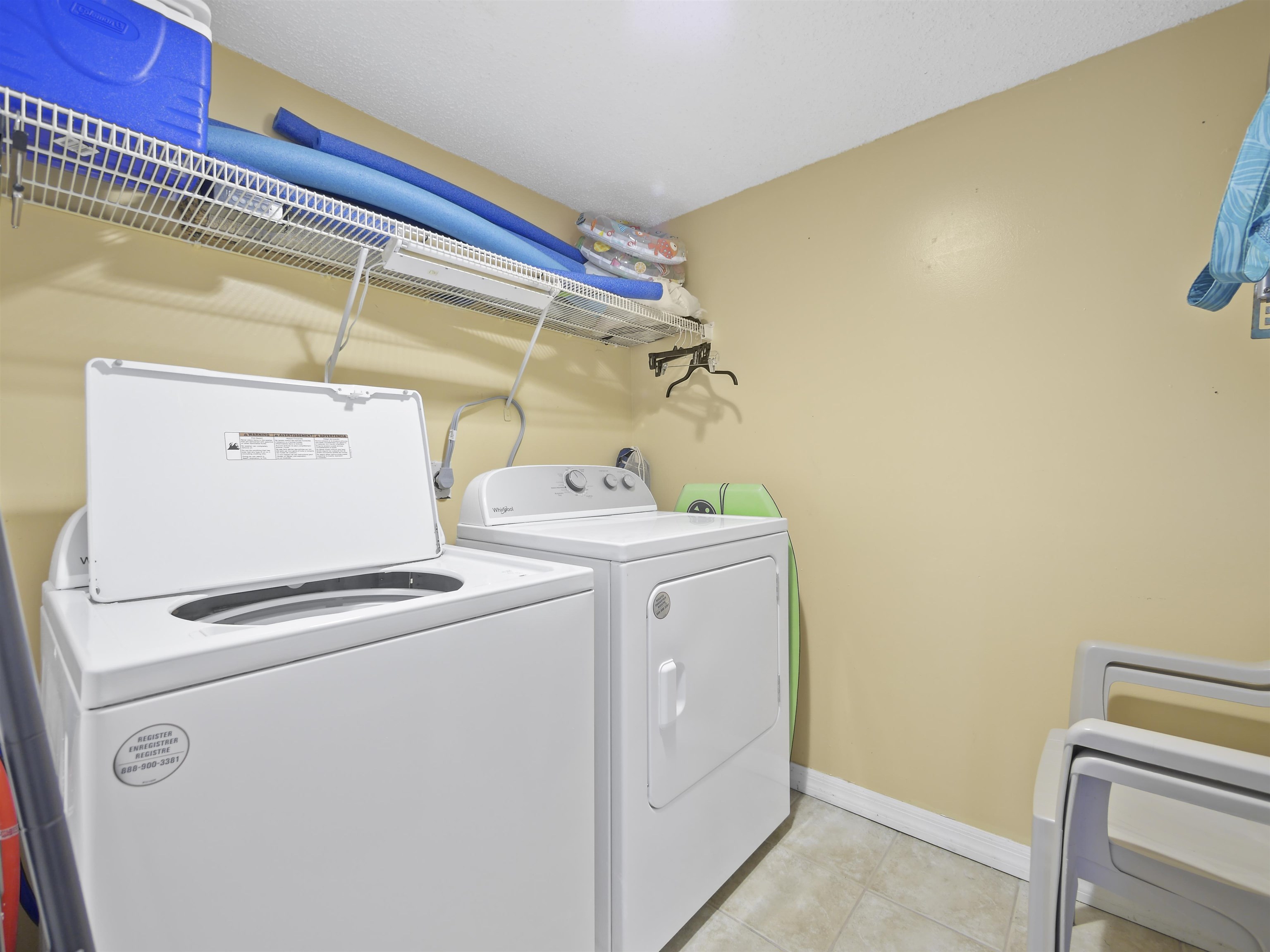 7175 A1A South St. Augustine, FL 32080 - Photo 27 of 35 a utility room with dryer and washer