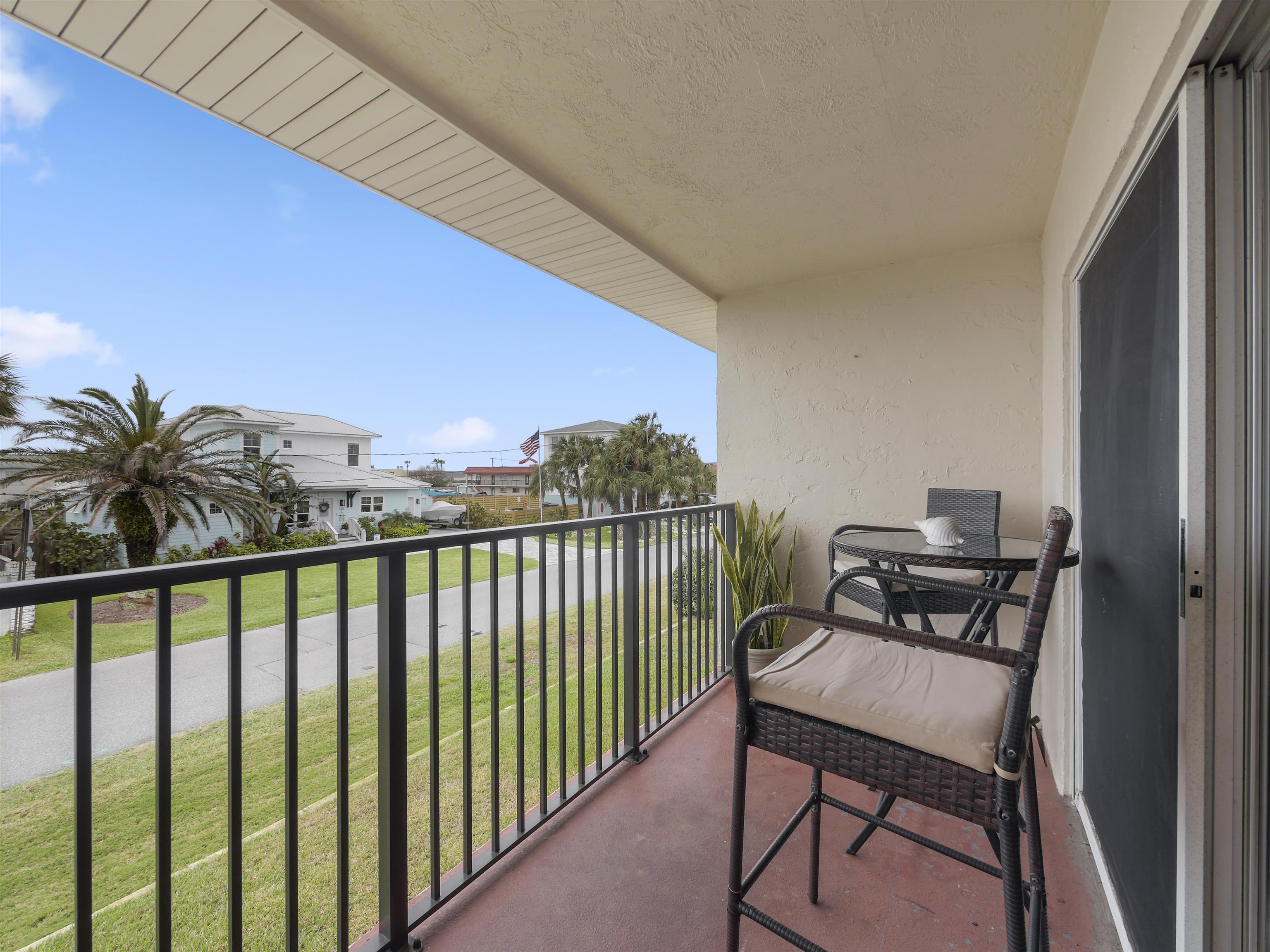 7175 A1A South St. Augustine, FL 32080 - Photo 28 of 35 a view of a balcony with furniture