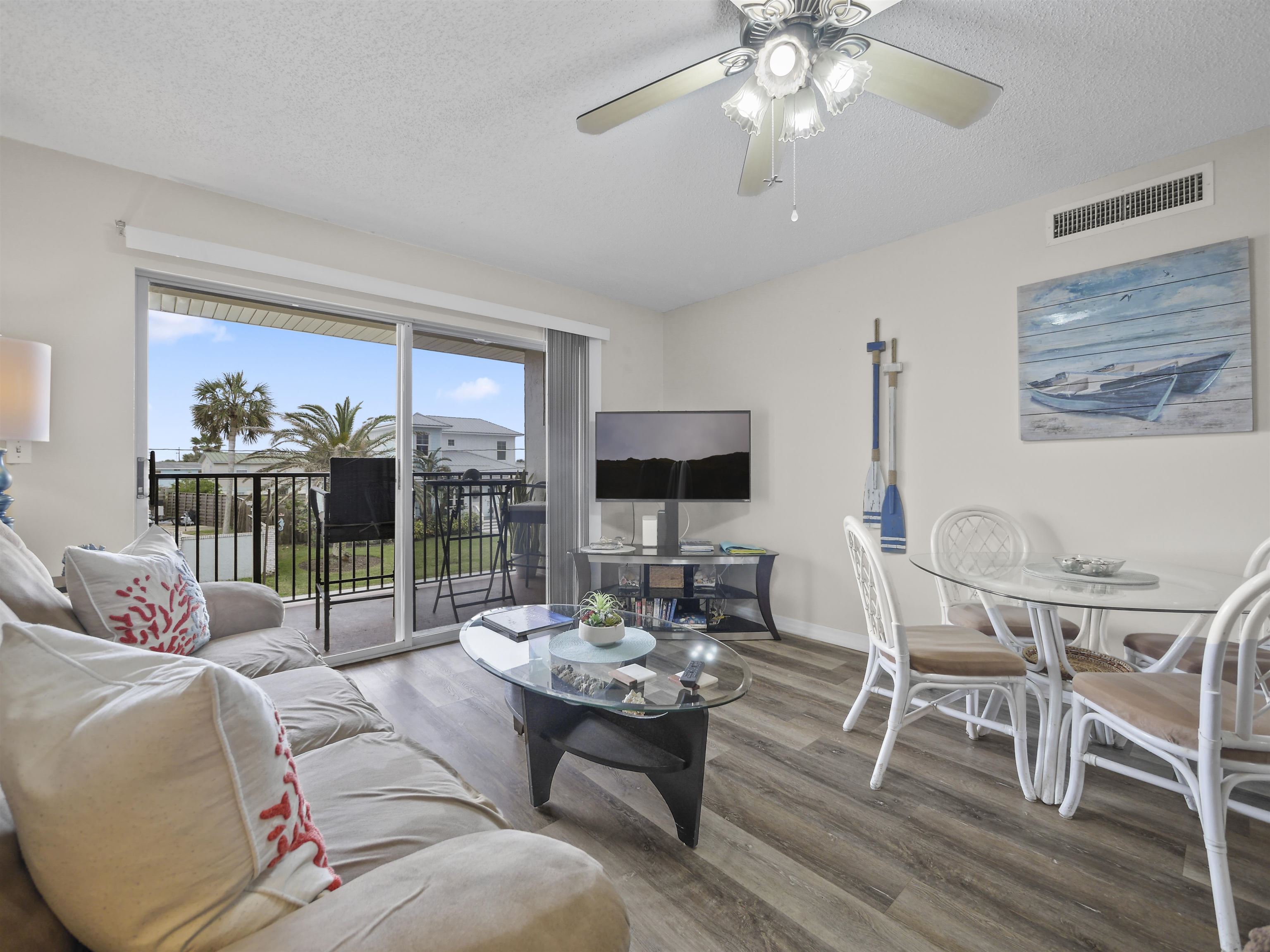 7175 A1A South St. Augustine, FL 32080 - Photo 8 of 35 a living room with furniture and a large window