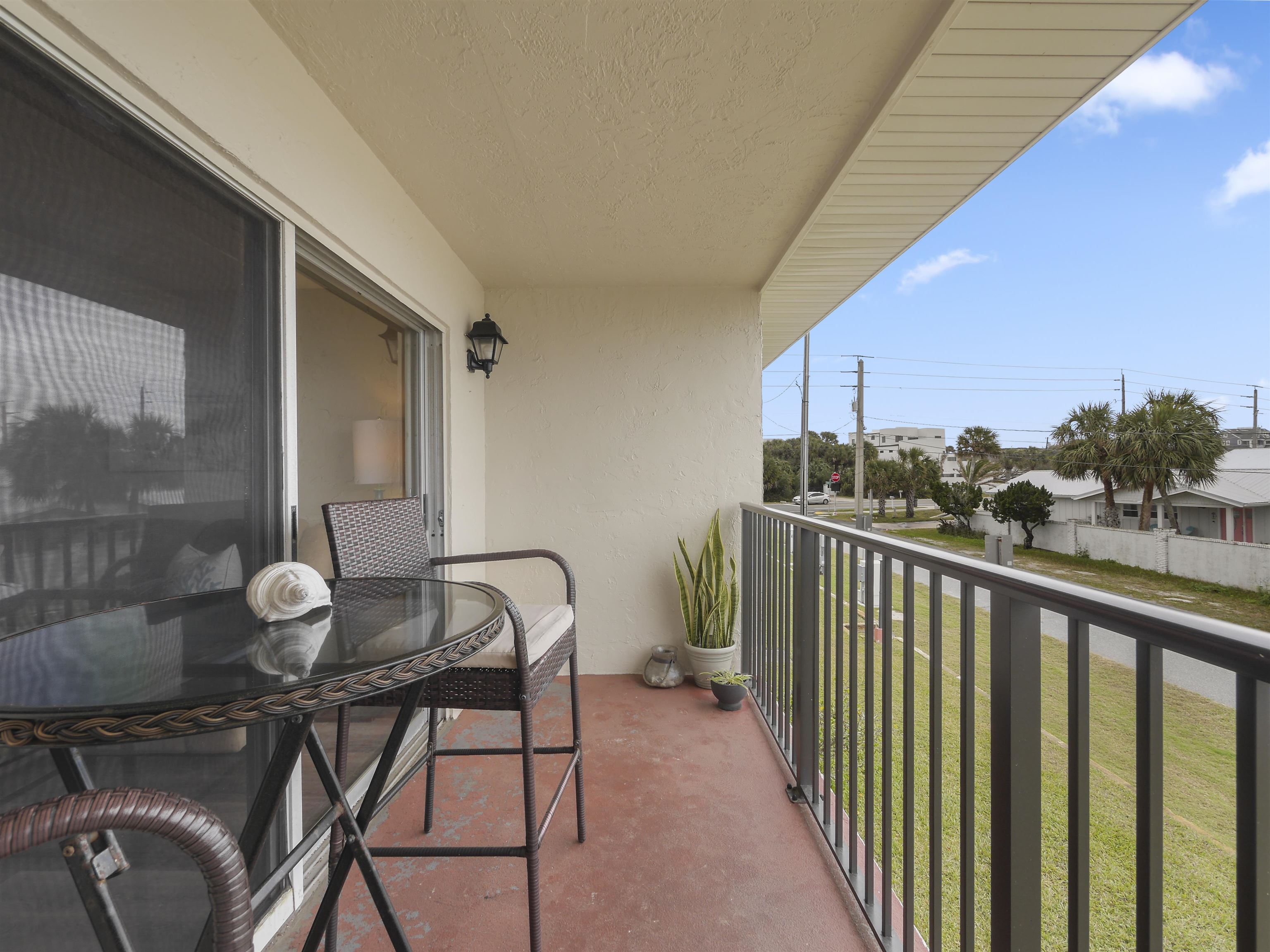 7175 A1A South St. Augustine, FL 32080 - Photo 9 of 35 a view of a balcony with chairs