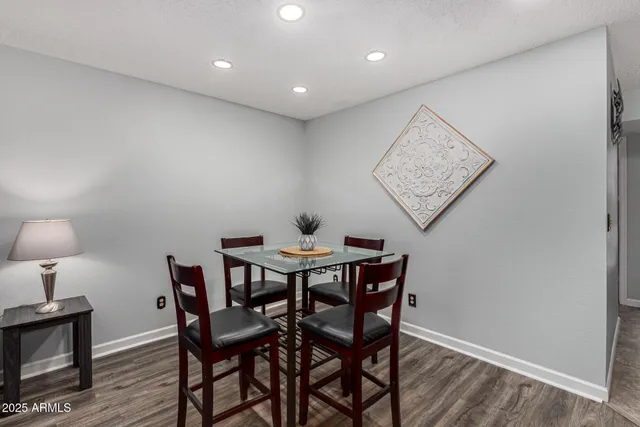 a view of a dining room with furniture