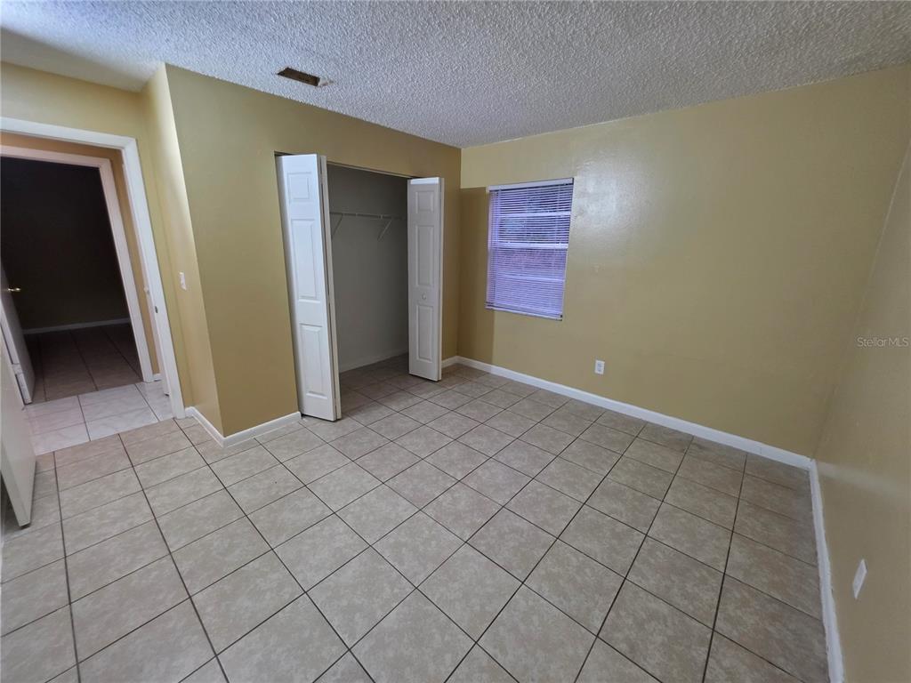 1836 Southwest 109th Place Ocala, FL 34476 - Photo 18 of 24 an empty room with windows
