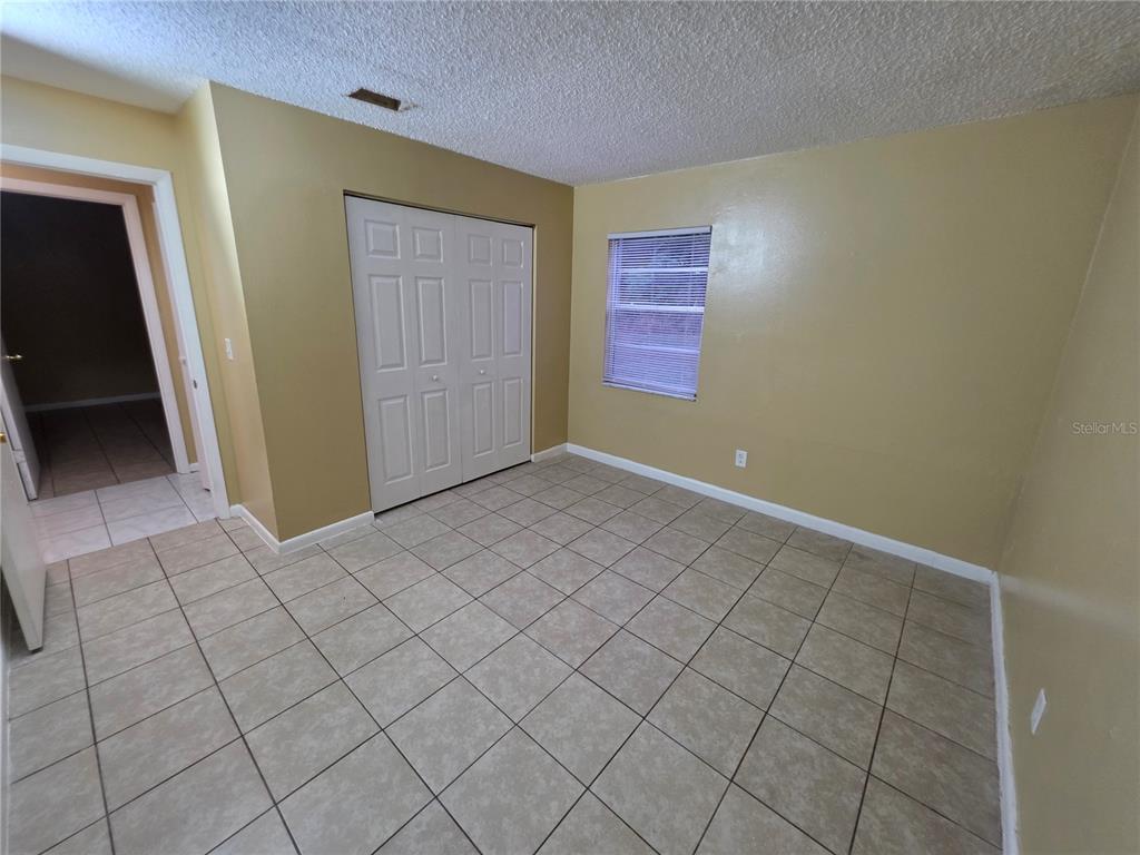 1836 Southwest 109th Place Ocala, FL 34476 - Photo 19 of 24 an empty room with windows