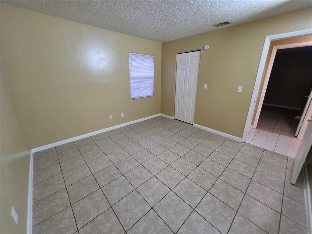1836 Southwest 109th Place Ocala, FL 34476 - Photo 21 of 24 a view of an empty room and window