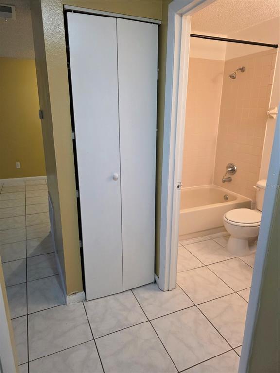 1836 Southwest 109th Place Ocala, FL 34476 - Photo 24 of 24 a bathroom with a granite countertop shower and a toilet