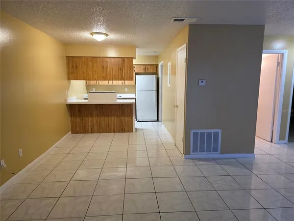 a large bathroom with a sink a mirror and a shower