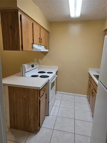 a utility room with a sink a washer and dryer