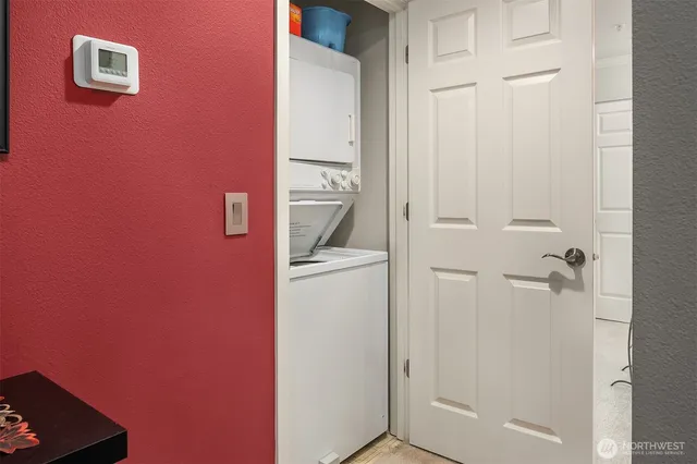 a bathroom with a sink and dryer
