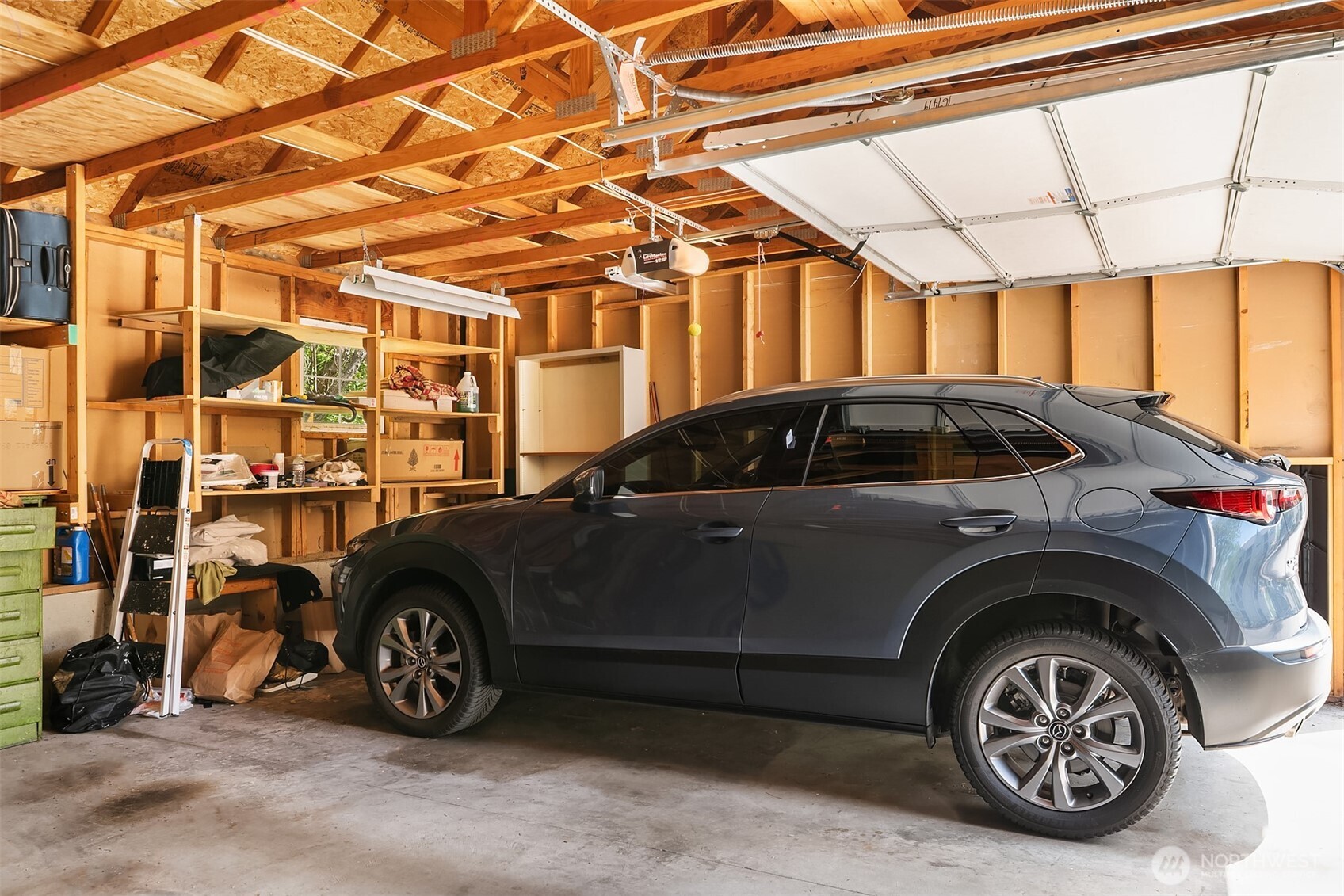 4109 224th Lane Southeast, Unit 213 Issaquah, WA 98029 - Photo 20 of 34 a car parked in front of a building