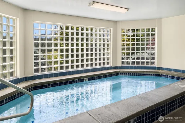 a view of a living room and windows