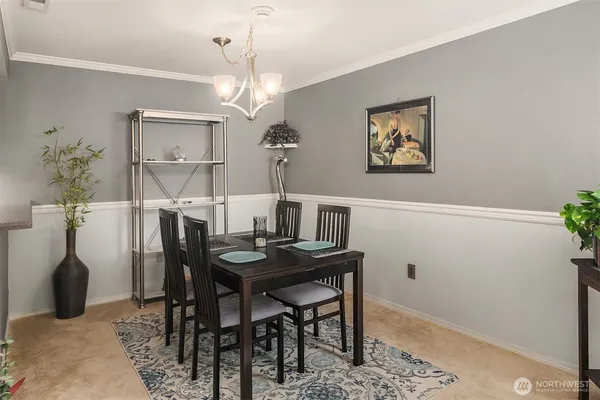 a view of a dining room with furniture