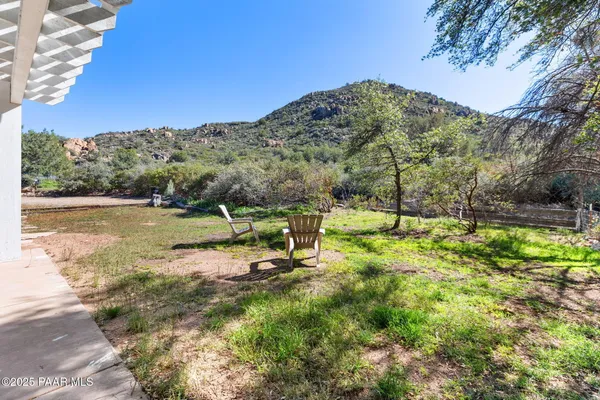 a view of a town with mountains in the background