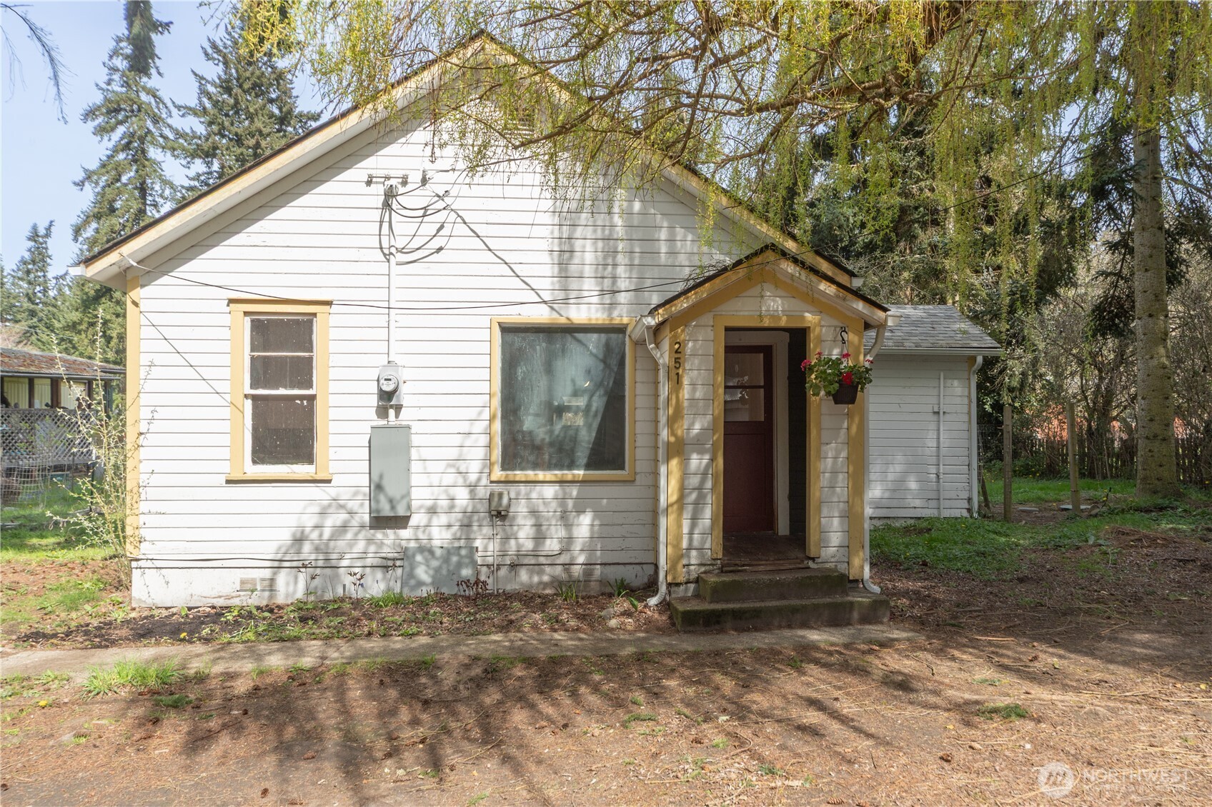 251 Arden Street Port Hadlock, WA 98339 - Photo 1 of 20 a front view of a house with a yard