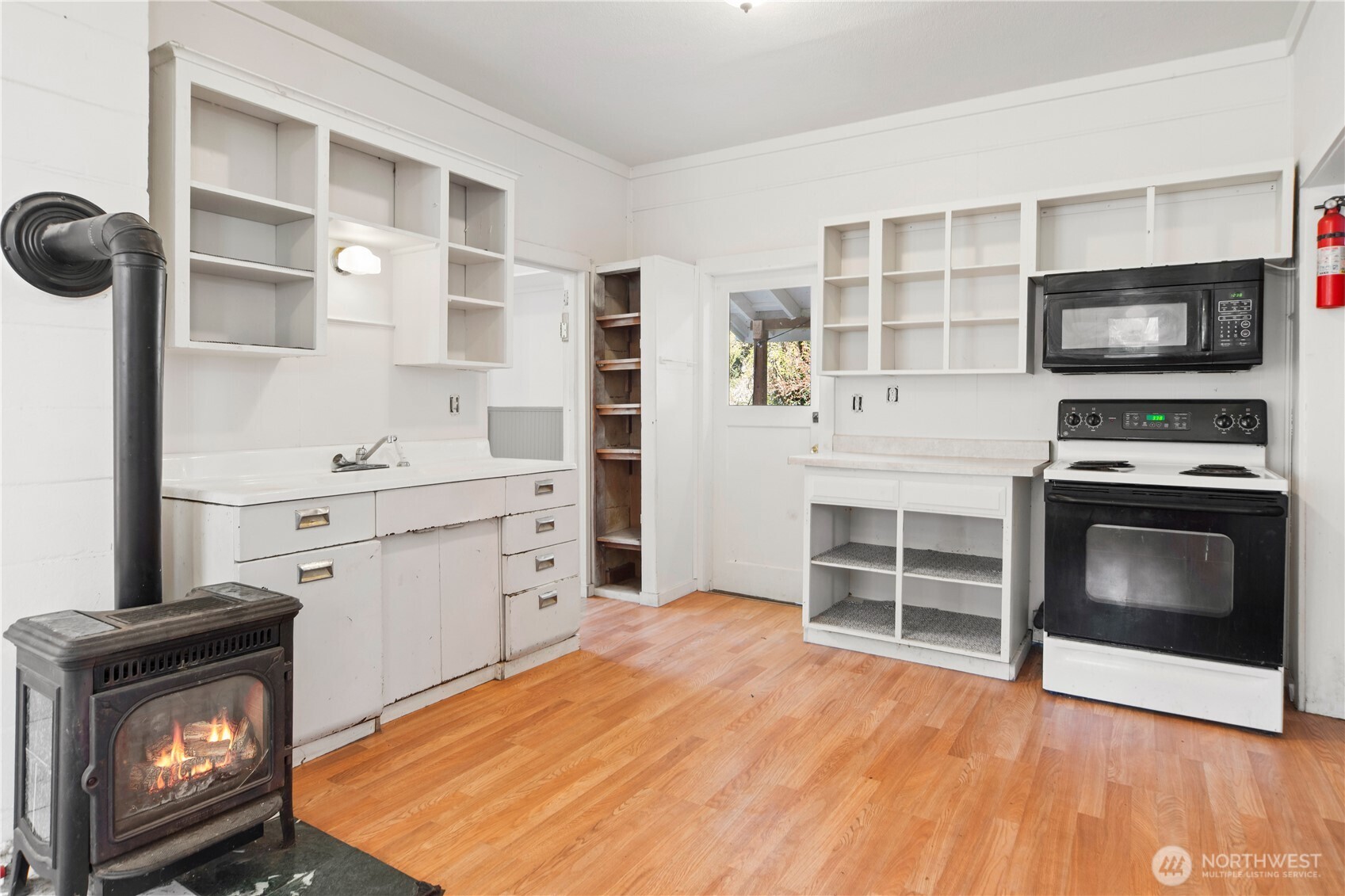 251 Arden Street Port Hadlock, WA 98339 - Photo 6 of 20 a kitchen with stainless steel appliances a stove sink and microwave