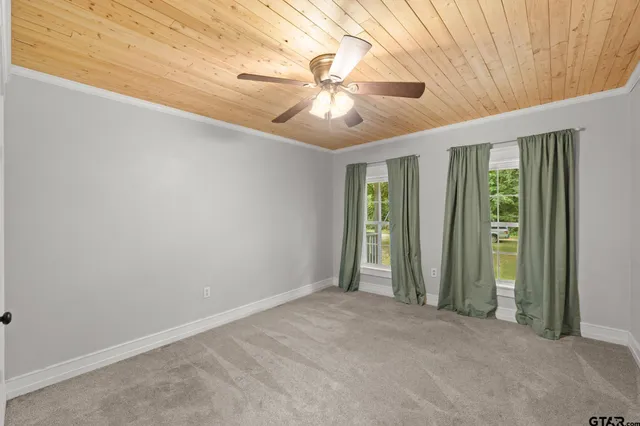 a bathroom with a shower and toilet