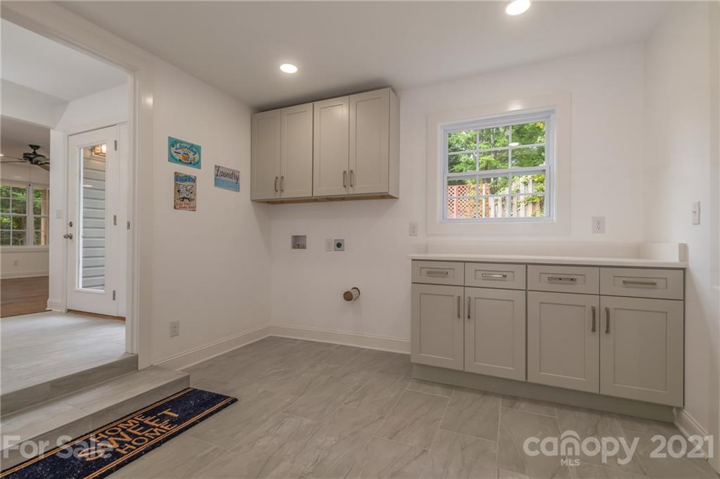 555 New Market Road Tryon, NC 28782 - Photo 22 of 37 an empty room with windows