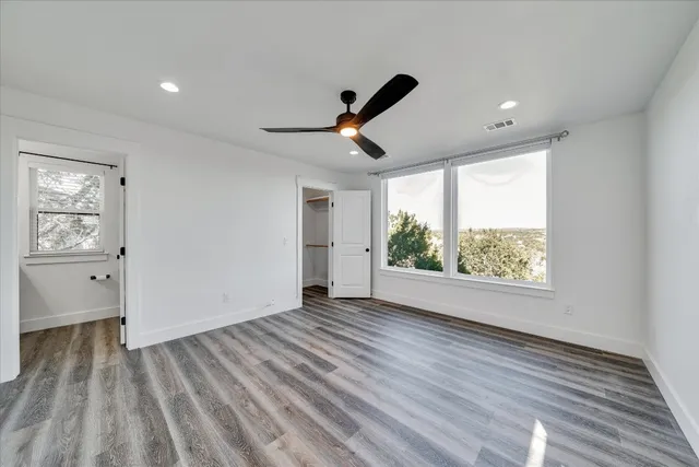 a view of room window and wooden floor