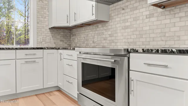 a room with furniture and a wooden floor