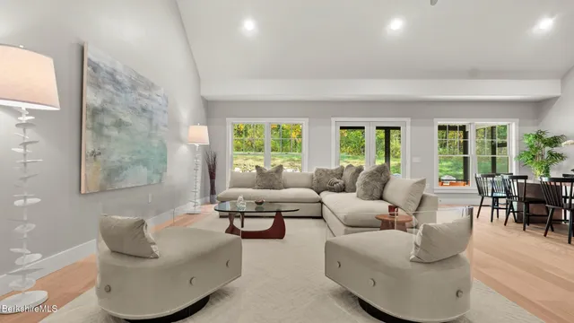 a kitchen with stainless steel appliances granite countertop a stove and a sink