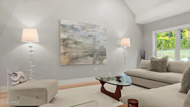 a kitchen with white cabinets stainless steel appliances and sink