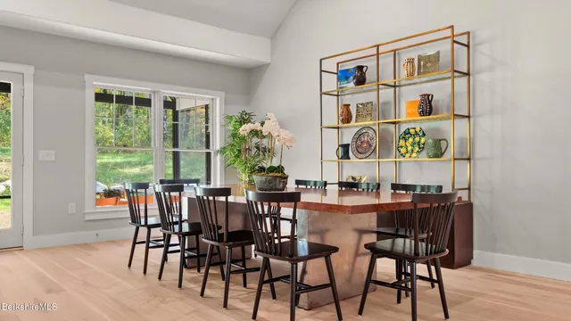 a bedroom with bed and a window