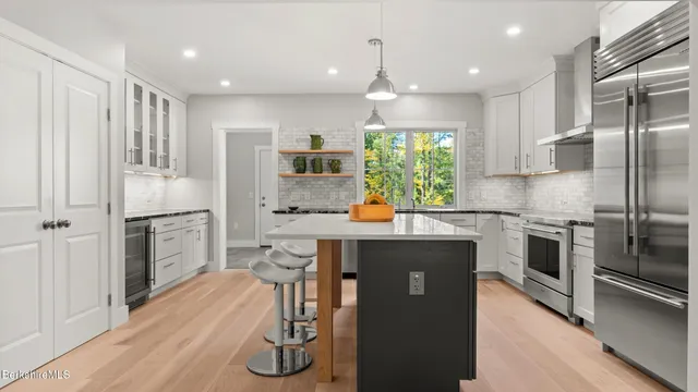 a bedroom with a bed and furniture