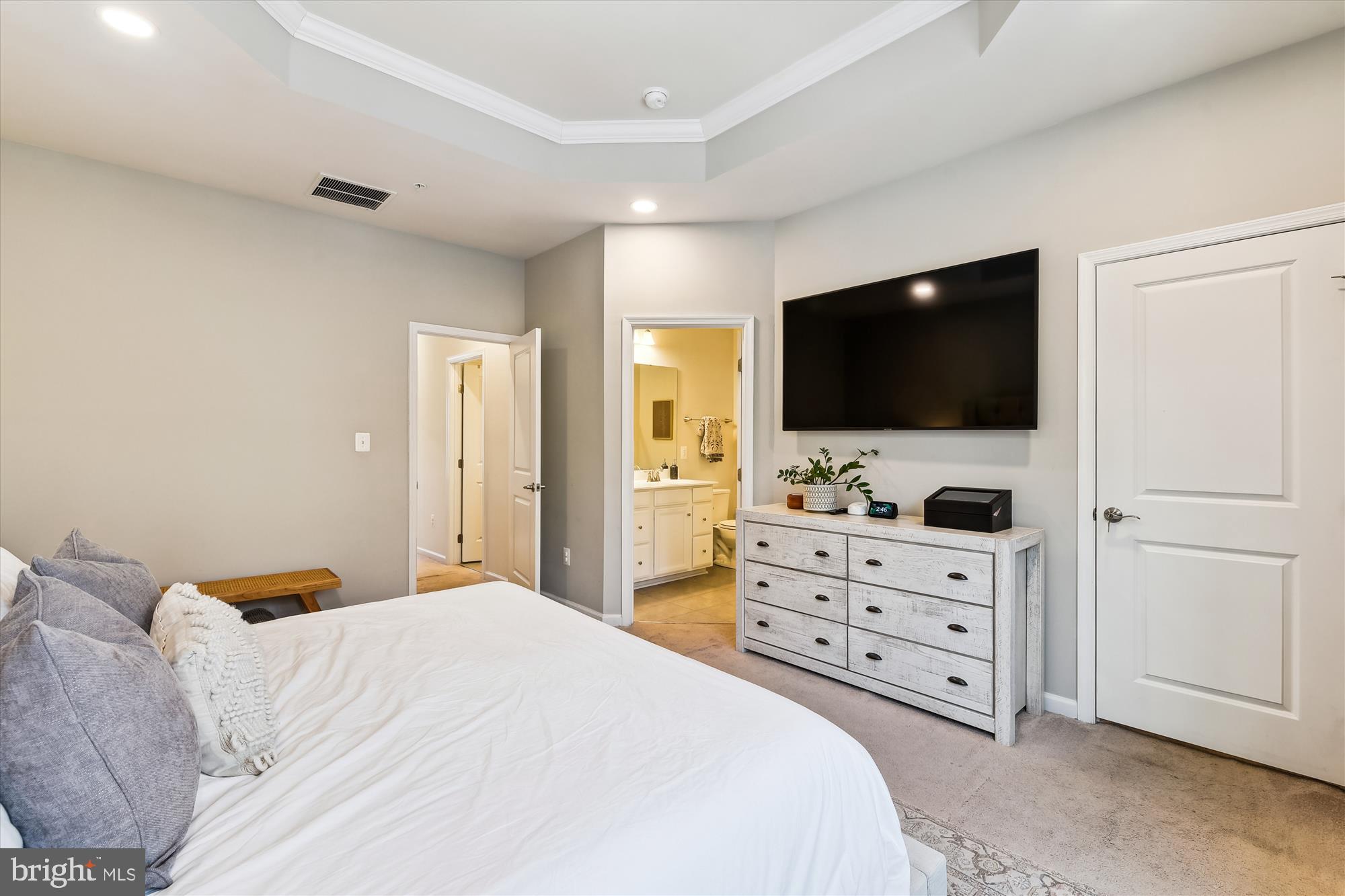 2907 Shaws Road Edgemere, MD 21219 - Photo 18 of 36 a bedroom with a bed and flat screen tv