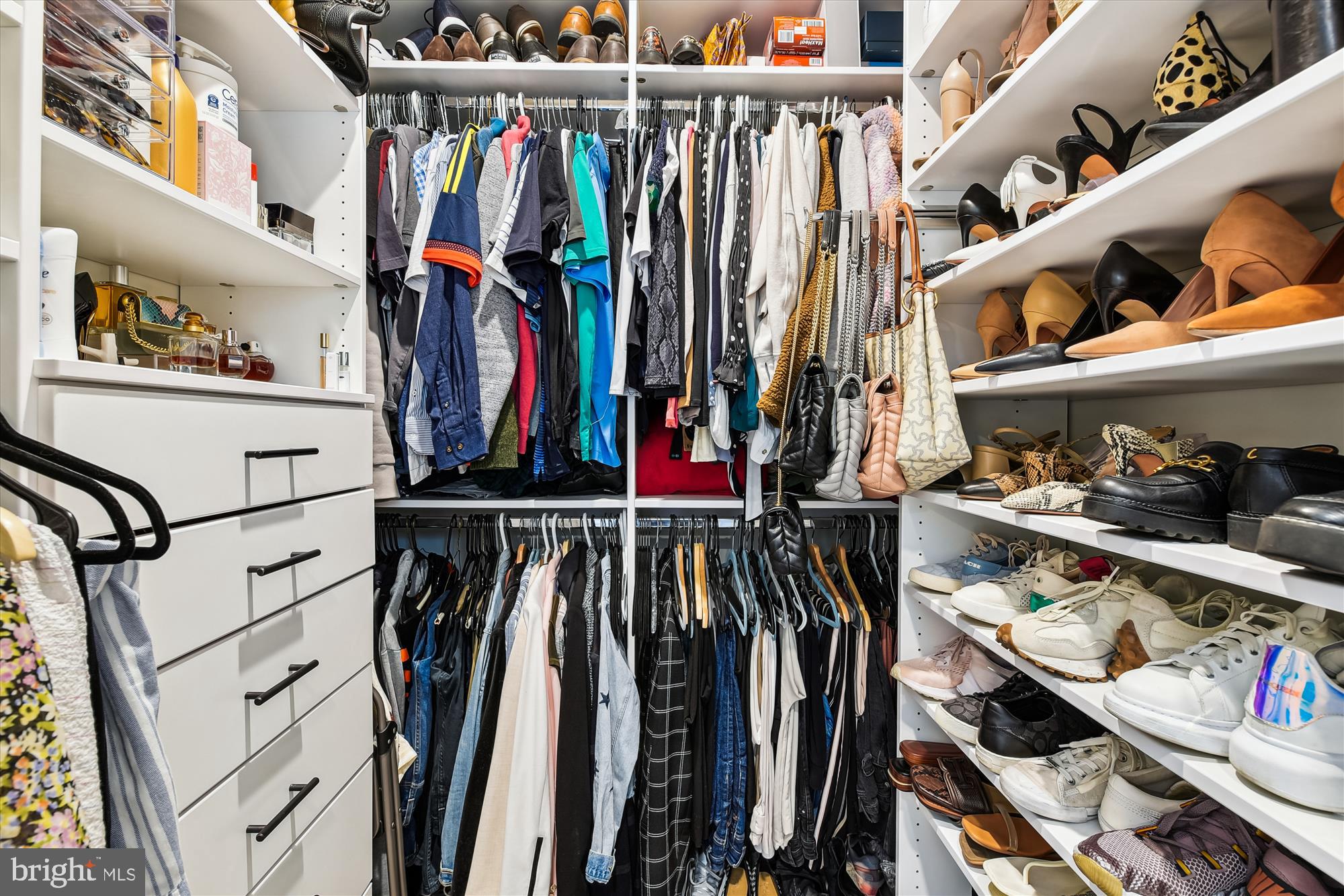 2907 Shaws Road Edgemere, MD 21219 - Photo 19 of 36 a view of walk in closet with clothes and shoes