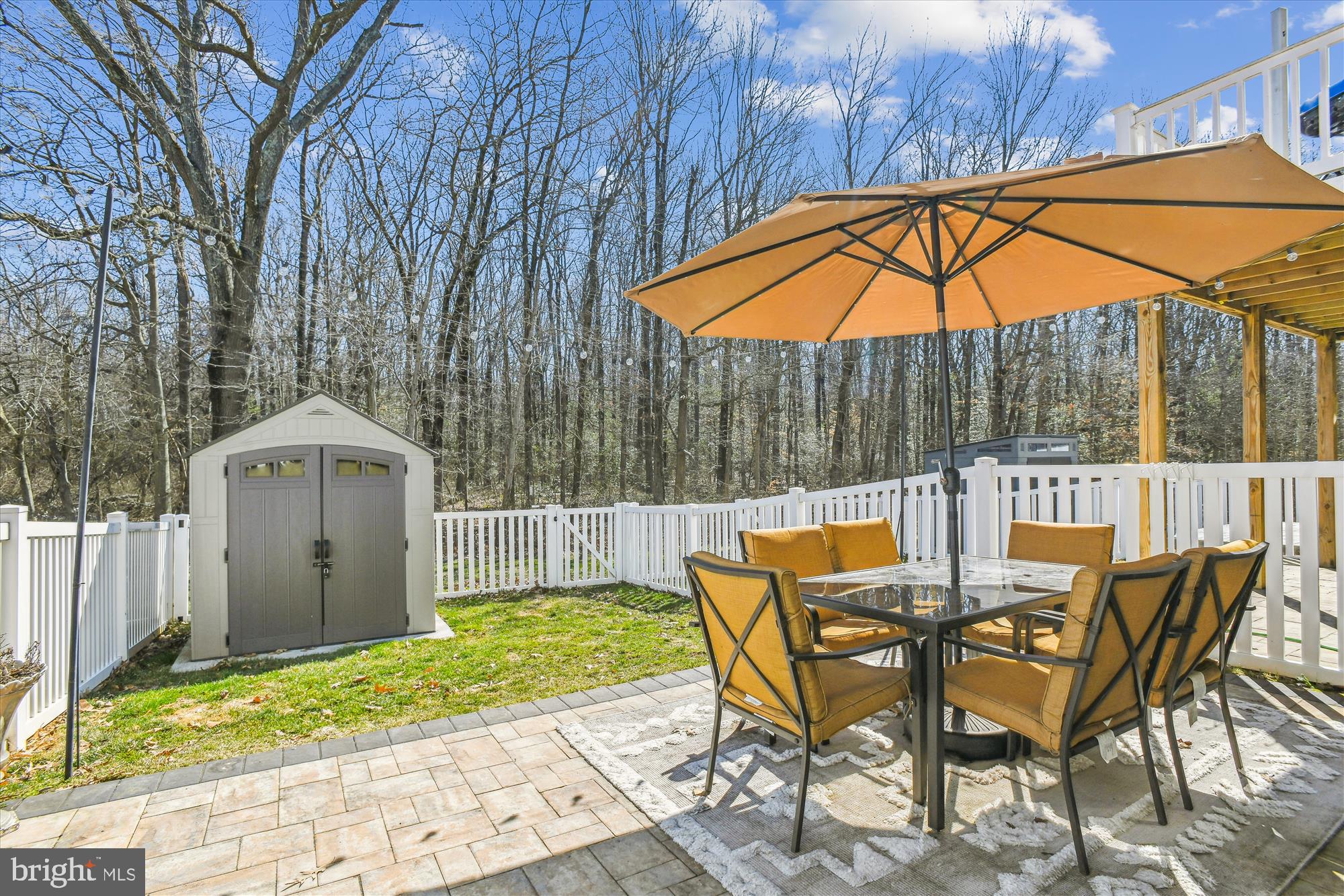 2907 Shaws Road Edgemere, MD 21219 - Photo 25 of 36 a backyard of a house with table and chairs