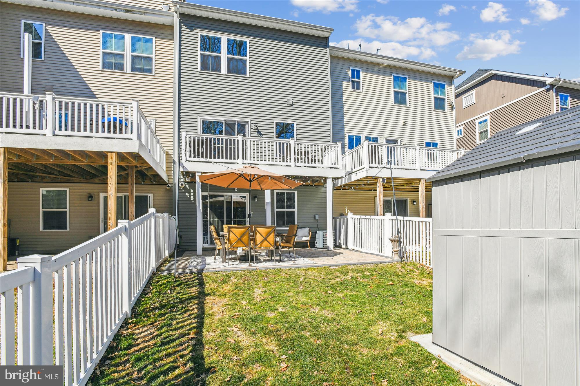 2907 Shaws Road Edgemere, MD 21219 - Photo 26 of 36 a view of a house with a porch and furniture