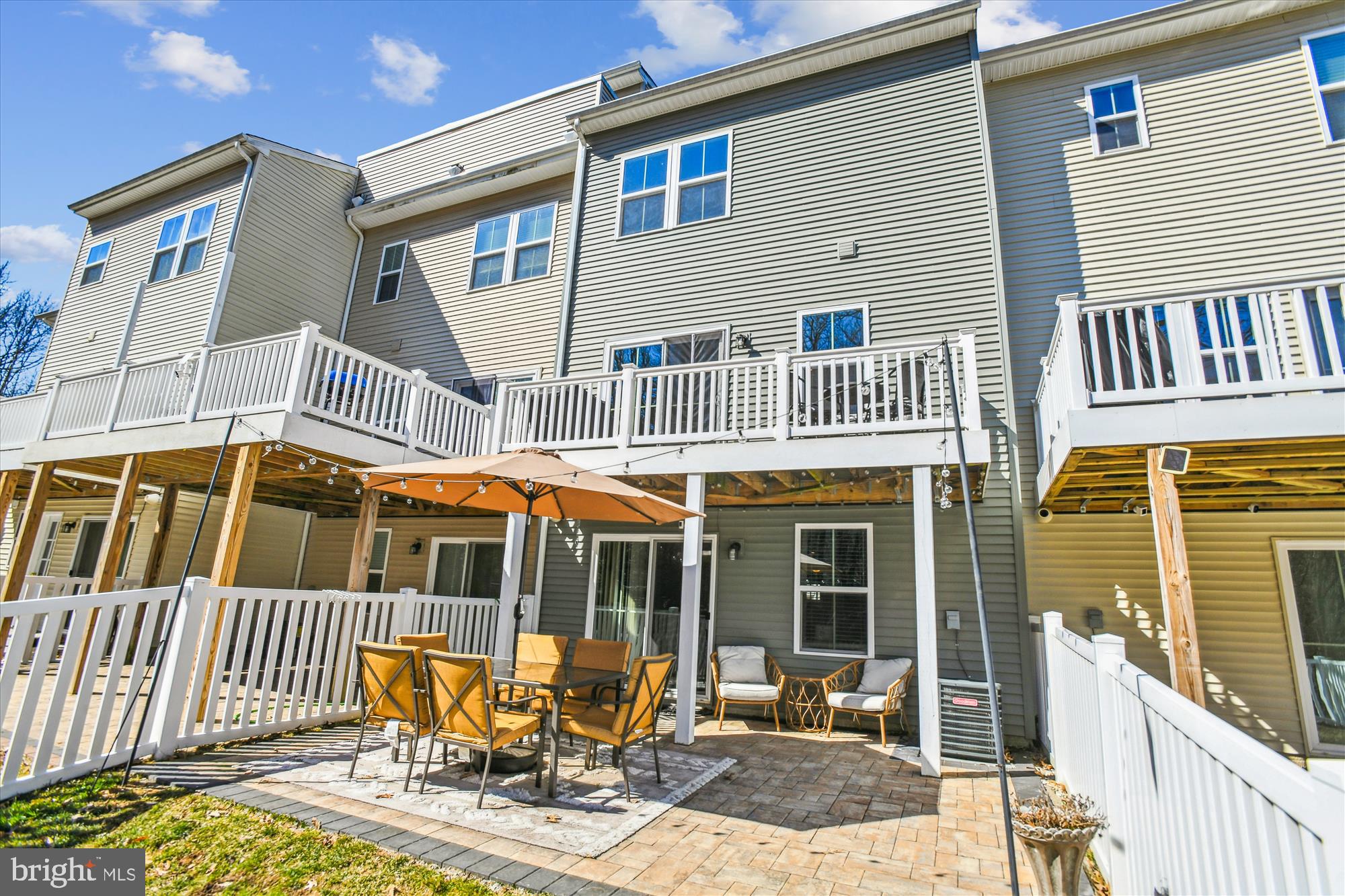 2907 Shaws Road Edgemere, MD 21219 - Photo 28 of 36 a front view of a house with outdoor seating