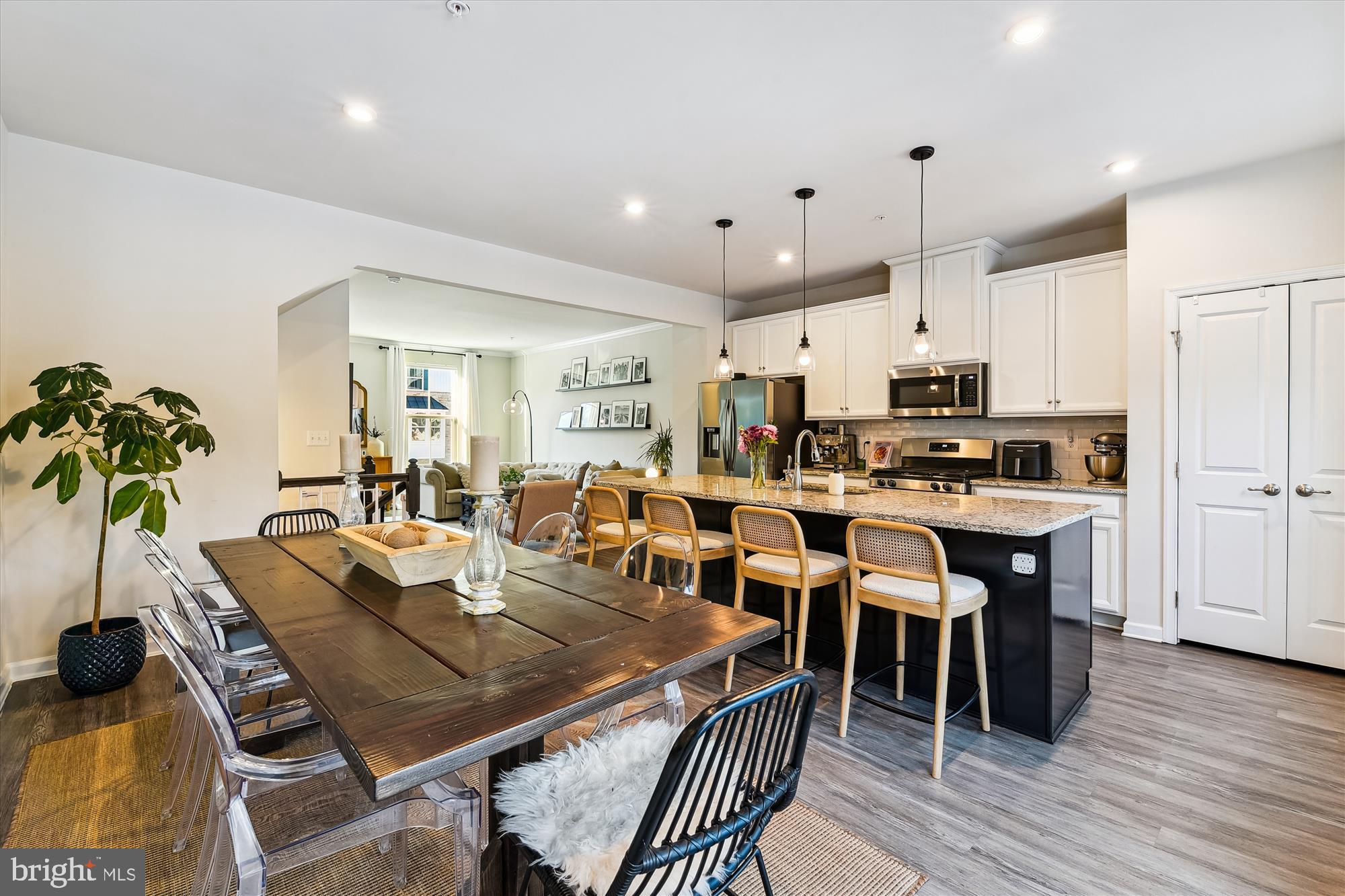 2907 Shaws Road Edgemere, MD 21219 - Photo 6 of 36 a view of a dining room with furniture and wooden floor