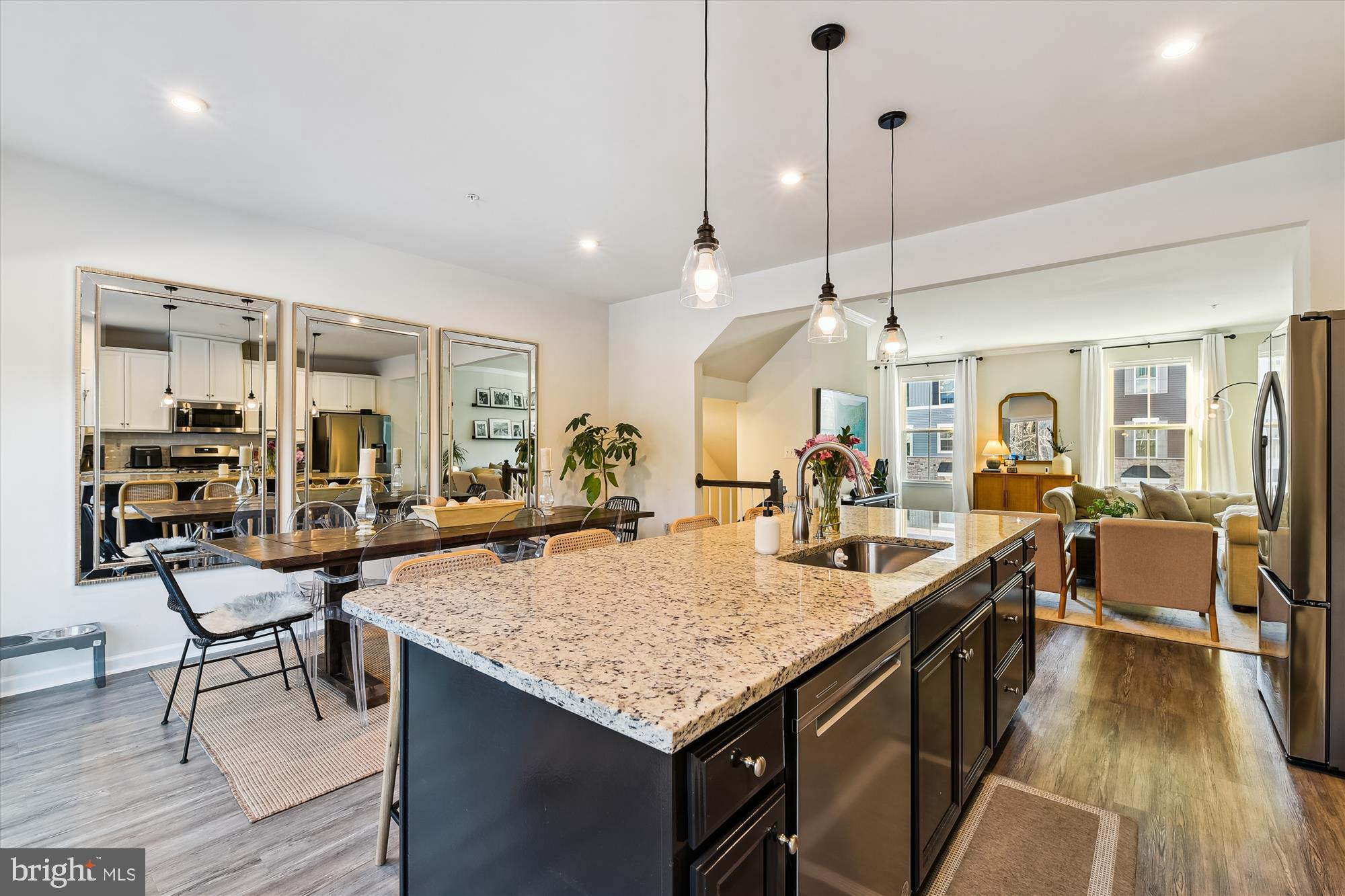 2907 Shaws Road Edgemere, MD 21219 - Photo 10 of 36 a kitchen with granite countertop a table and chairs in it