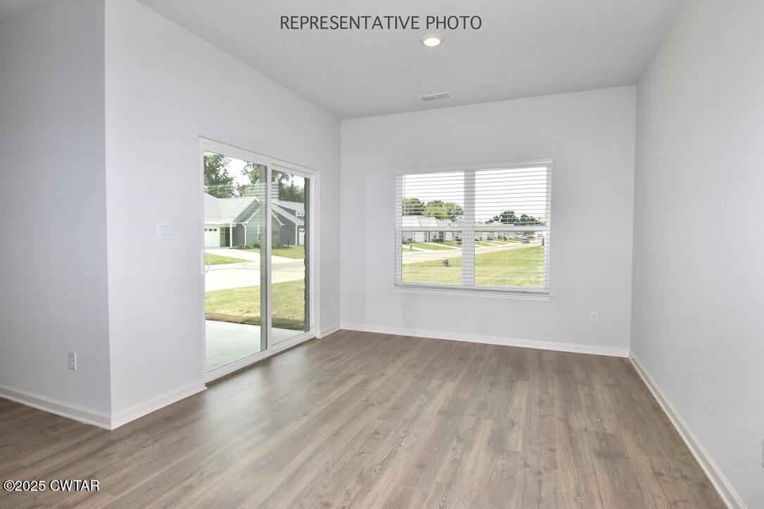67 Clarendon Cove Jackson, TN 38305 - Photo 8 of 19 an empty room with windows