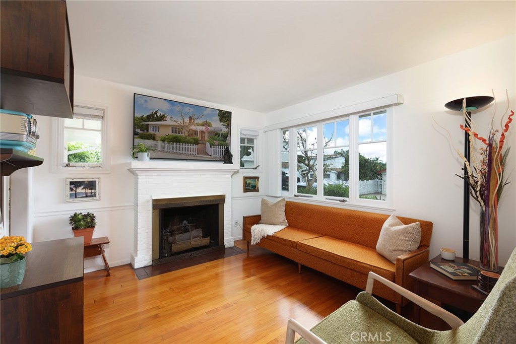 556 Through Street Laguna Beach, CA 92651 - Photo 12 of 30 a living room with furniture and a fireplace