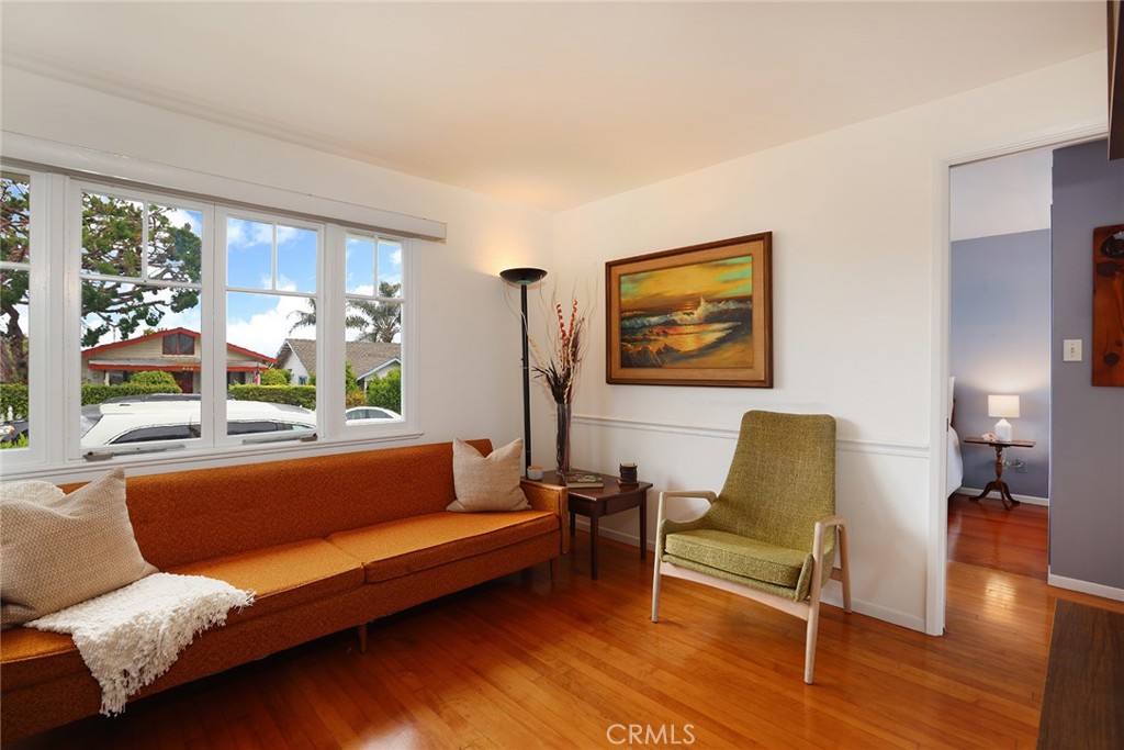 556 Through Street Laguna Beach, CA 92651 - Photo 13 of 30 a living room with furniture and a large window