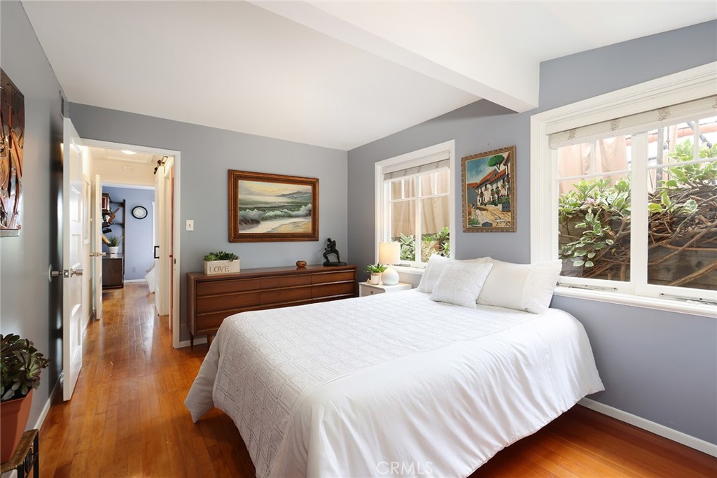 556 Through Street Laguna Beach, CA 92651 - Photo 15 of 30 a bedroom with a large bed and a large window