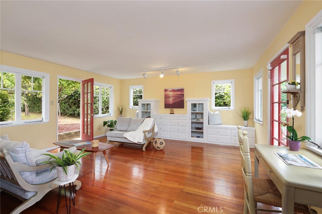 556 Through Street Laguna Beach, CA 92651 - Photo 8 of 30 a living room with furniture window and wooden floor