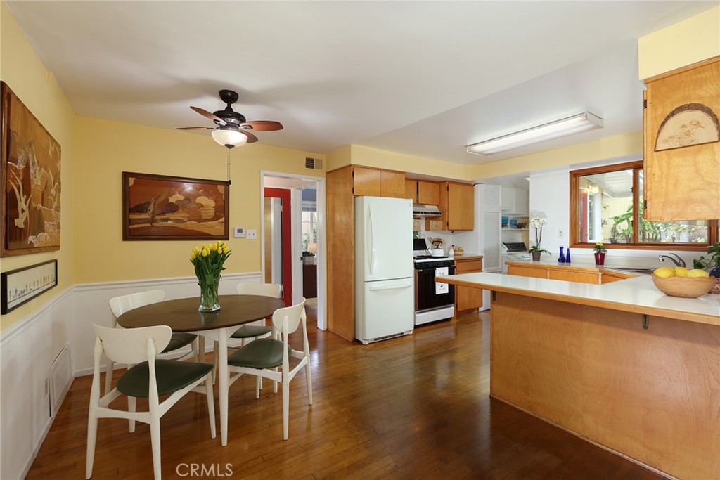 556 Through Street Laguna Beach, CA 92651 - Photo 10 of 30 a view of a dining room with furniture window and wooden floor